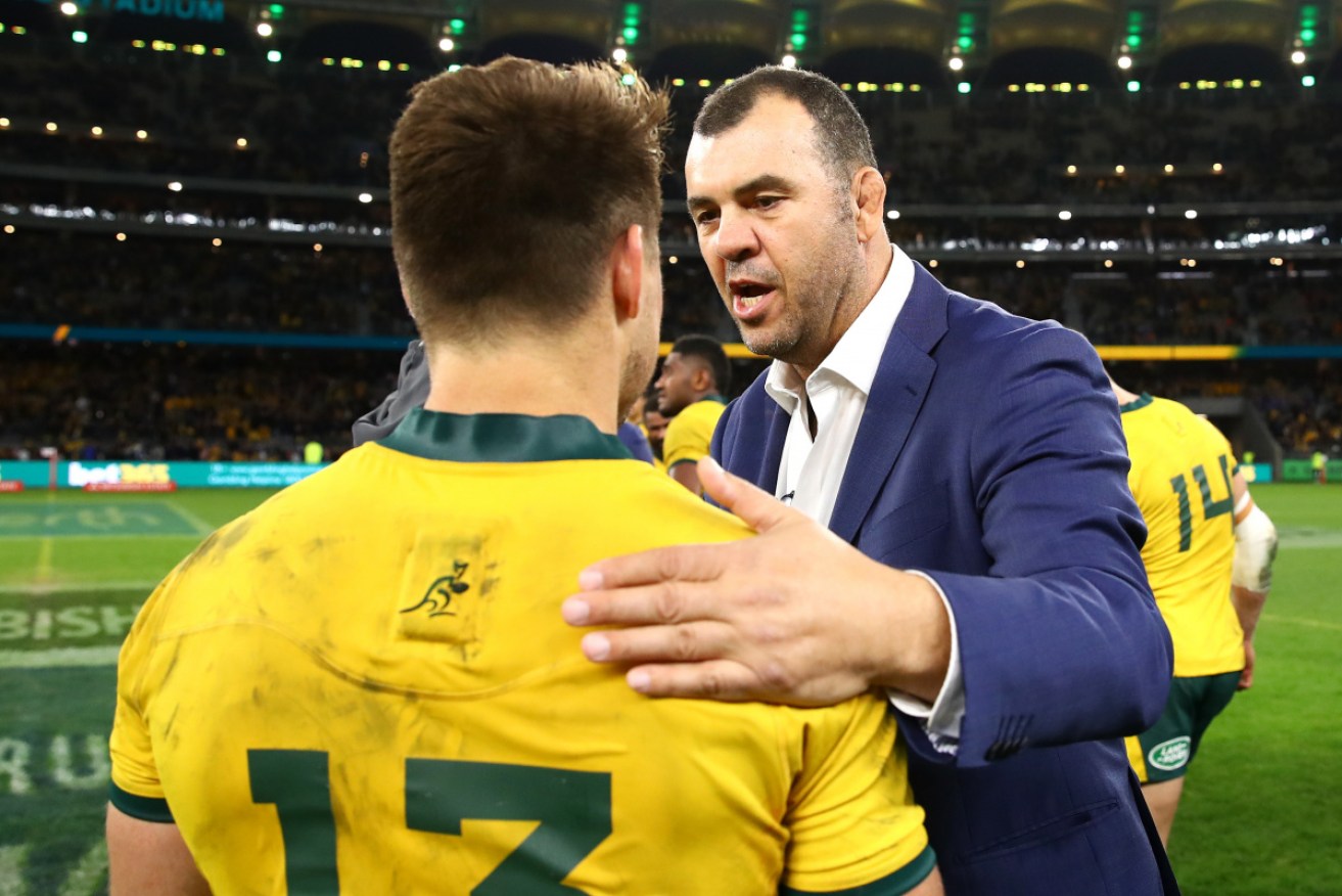 Michael Cheika congratulates James O'Connor after a successful return to the team. 