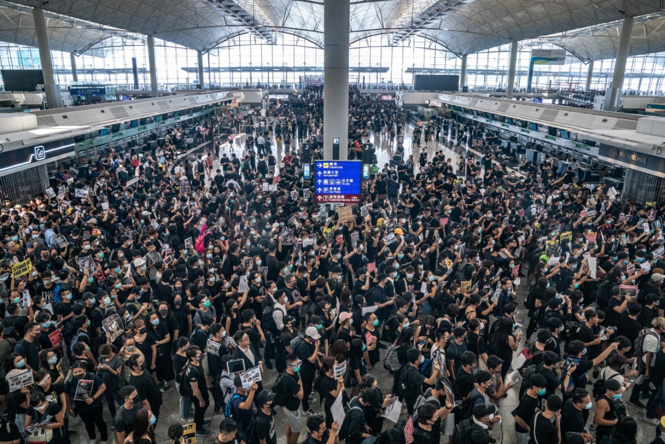Protesters occupy the departure hall of the Hong Kong International Airport on Monday. 