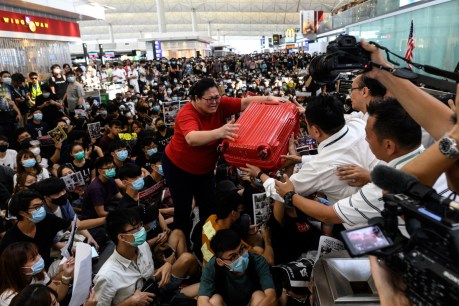 Protest chaos continues as police storm Hong Kong airport