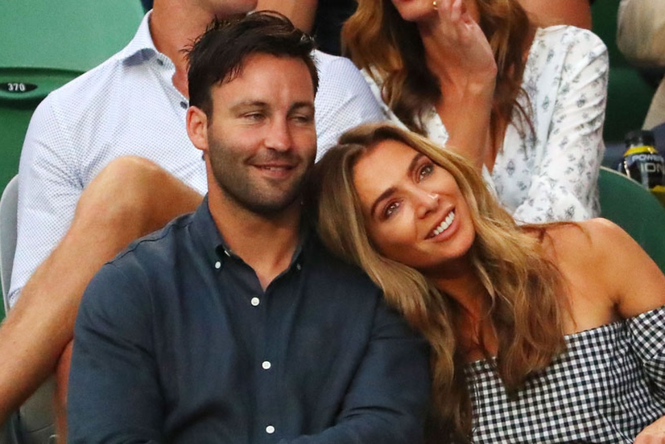 Jimmy and Nadia Bartel watch a match at the 2017 Australian Open in Melbourne.