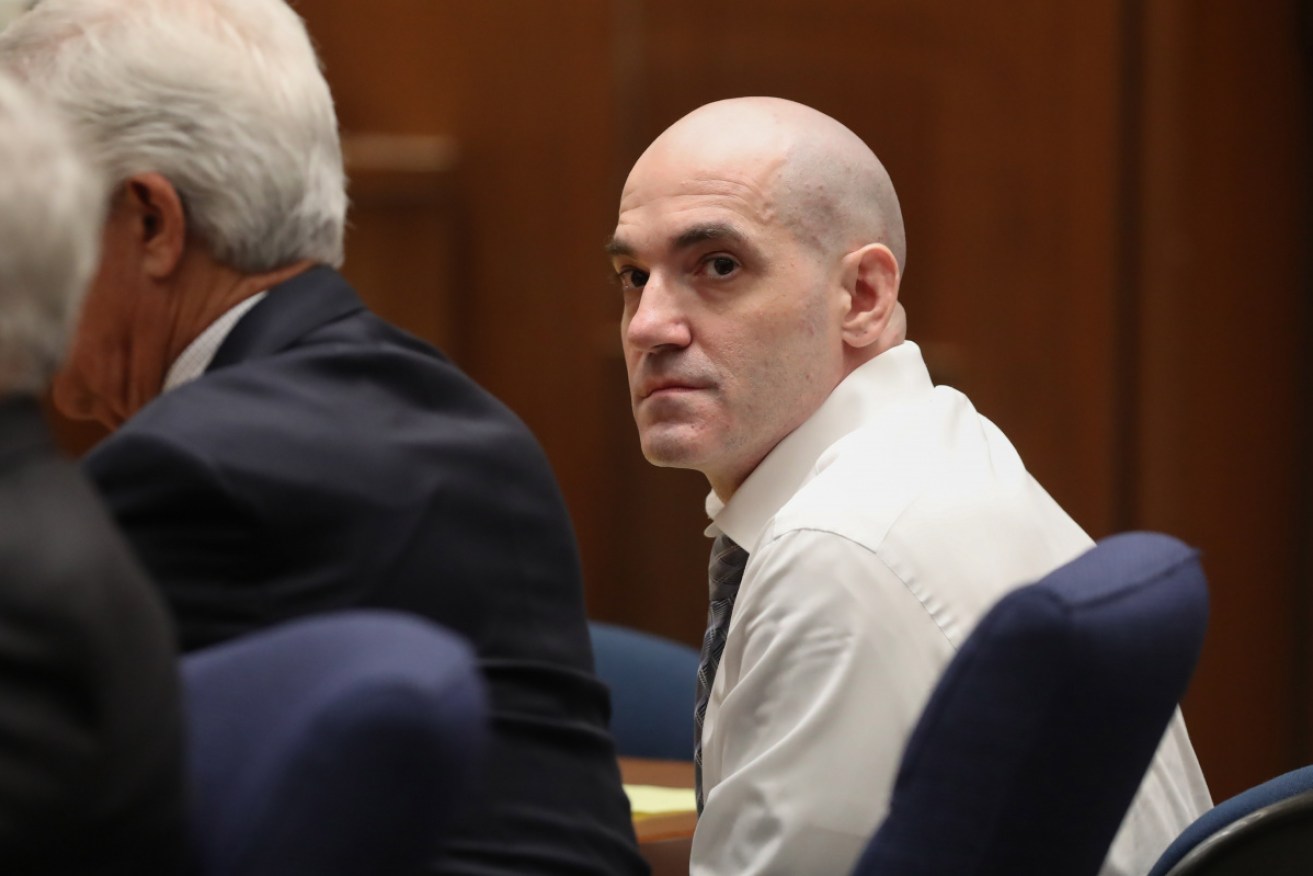 Alleged serial killer Michael Gargiulo, known as the 'Hollywood Ripper', listens as Ashton Kutcher testifies at his trial. 