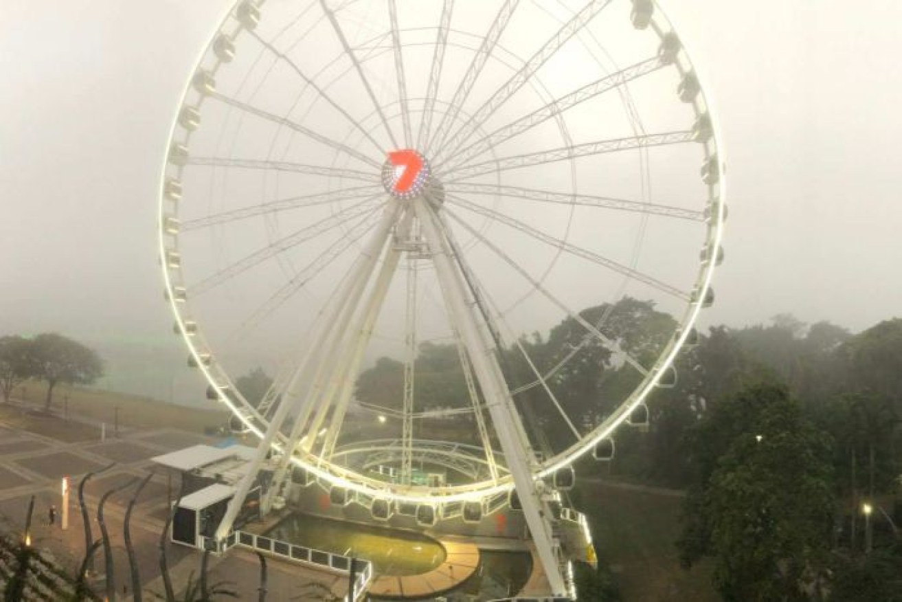 Brisbane city disappeared under a thick blanket of fog on Monday morning.