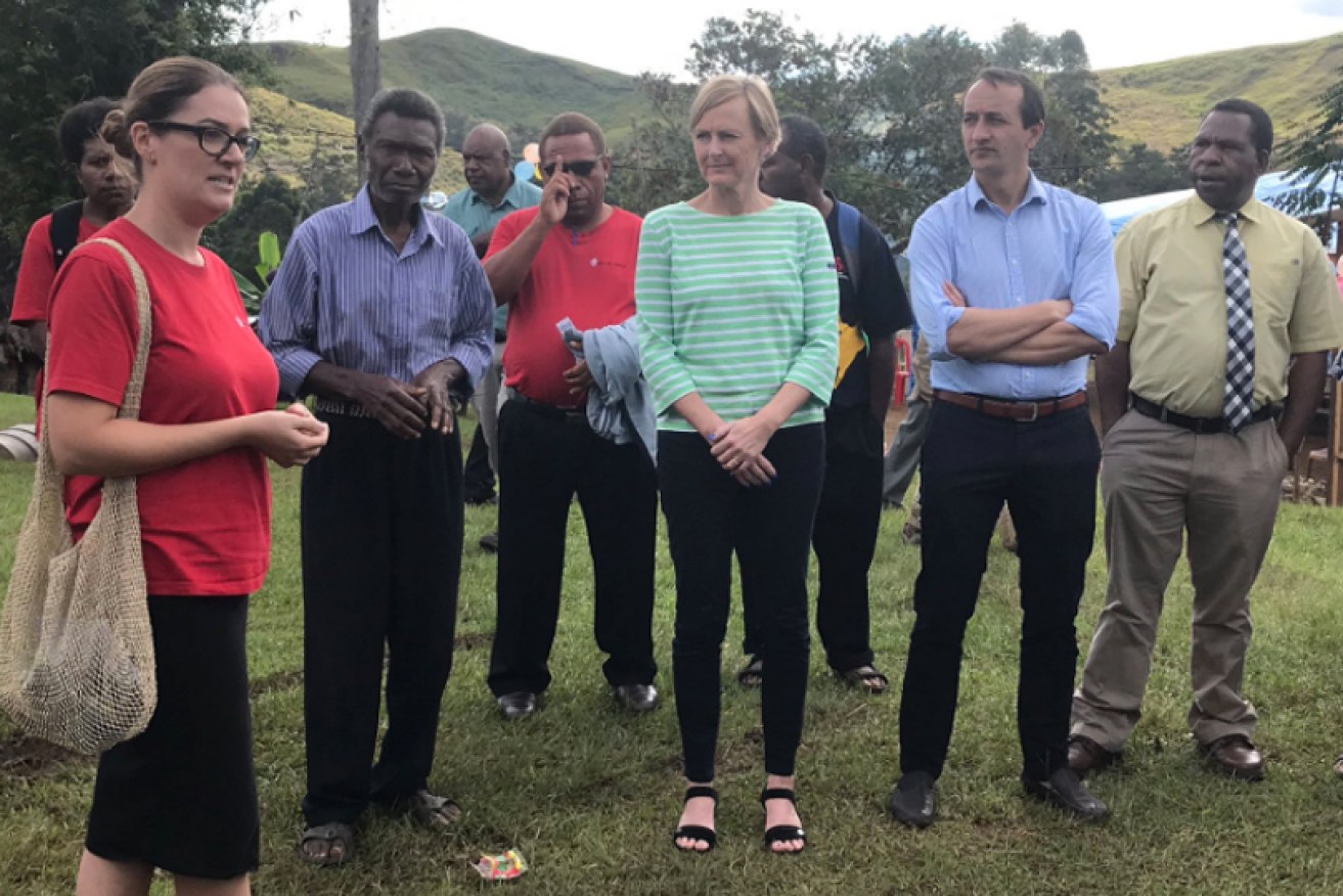 Higgins MP Katie Allen (in green) in PNG with, among others, Wentworth MP Dave Sharma (blue shirt).