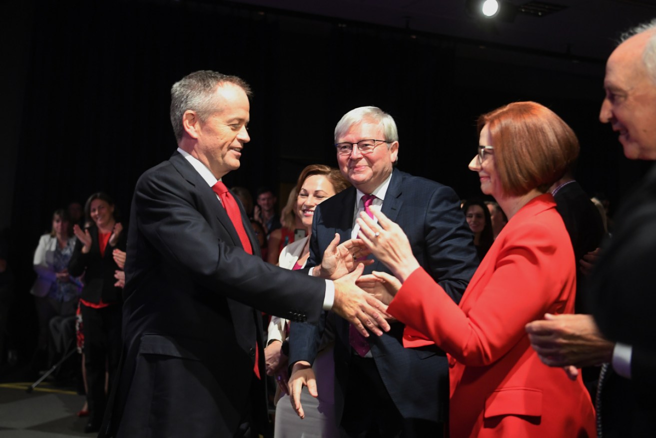 Mr Rudd flanked by Mr Shorten and former PM Julia Gillard at Labor's campaign launch in May.