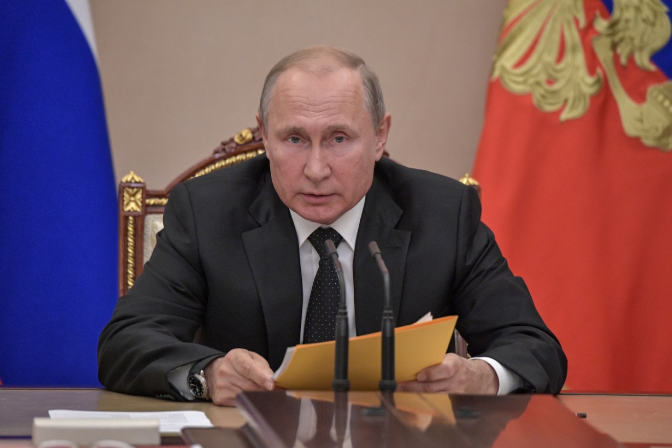 Vladimir Putin says a recent US missile test shows that it aims to deploy previous banned missiles.