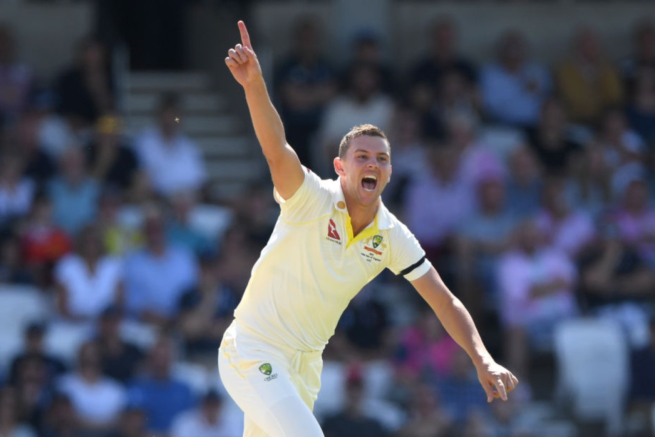 Josh Hazlewood celebrates after dismissing Jack Leach on day two of the third Ashes test.
