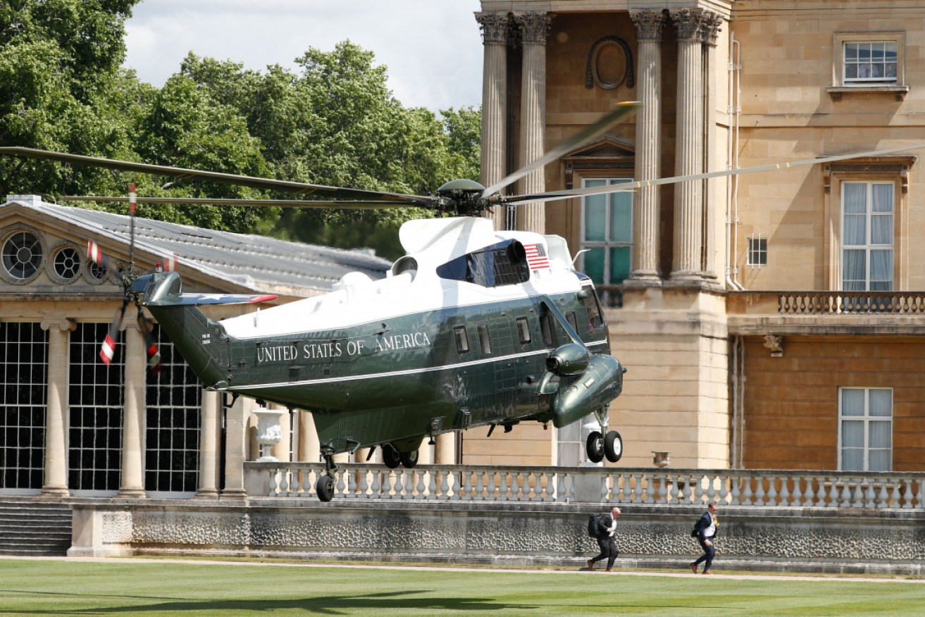 Marine One, with Donald and Melania Trump aboard, lands at Buckingham Palace.