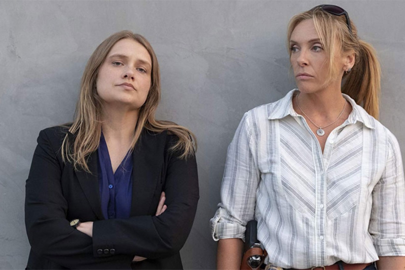 Australia's Toni Collette (right) and Merritt Wever star as cops in tense crime drama <i>Unbelievable.</i>