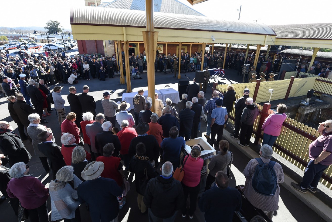 A crowd gathered at Albury railway station on Thursday morning as Tim Fischer's coffin arrived.