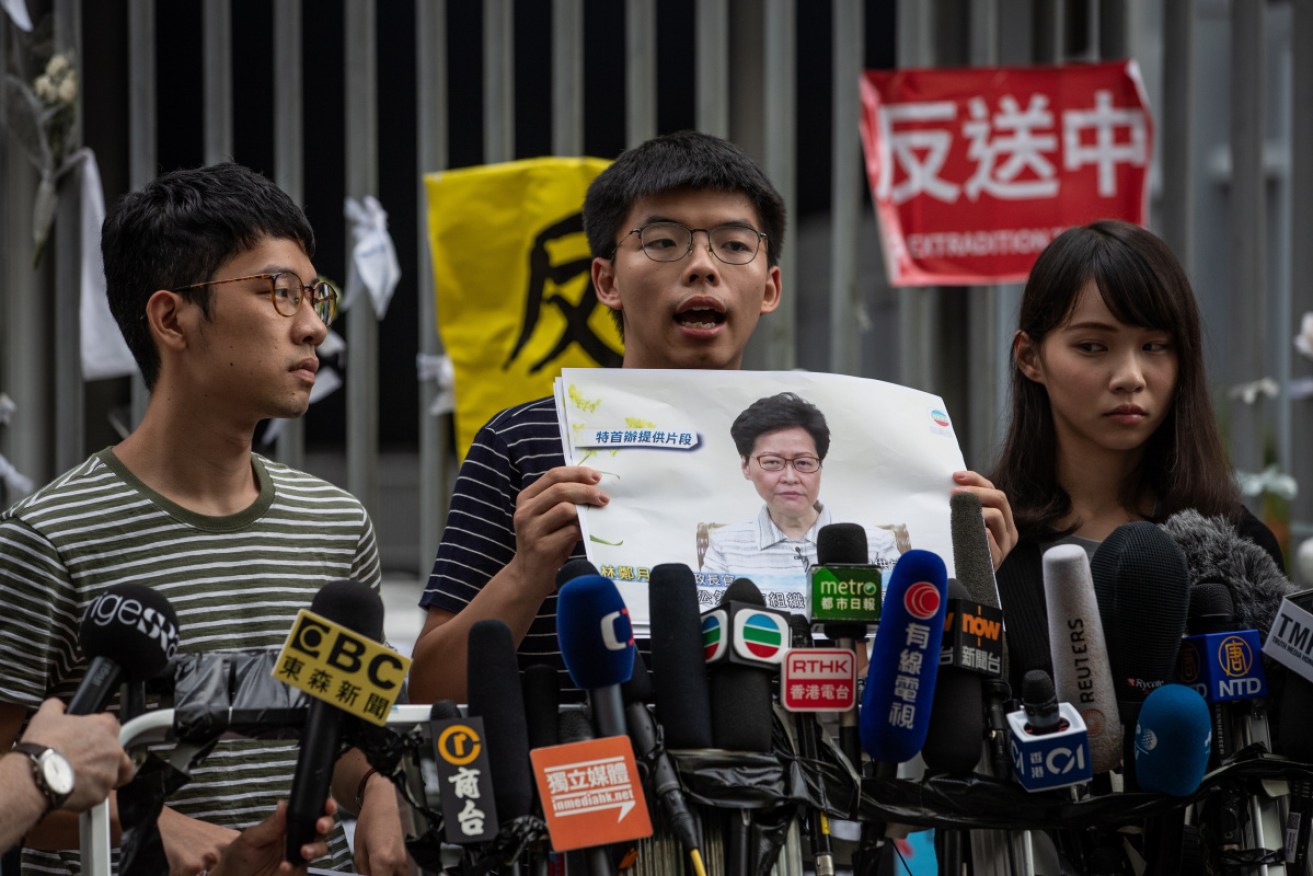 Joshua Wong (centre) and Agnes Chow with another activist, Nathan Law.