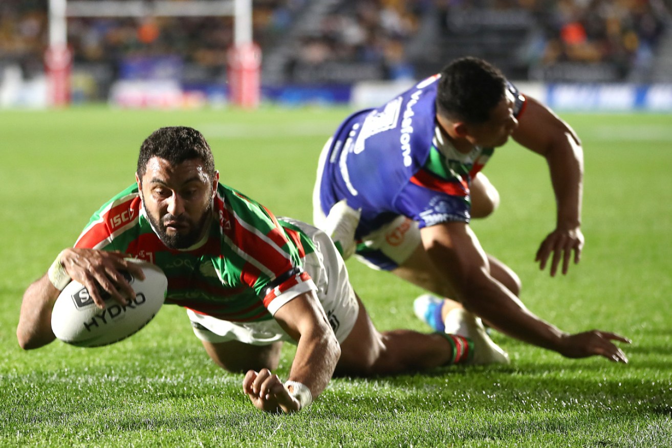 Alex Johnston of the Rabbitohs gets across the line against the Warriors. 