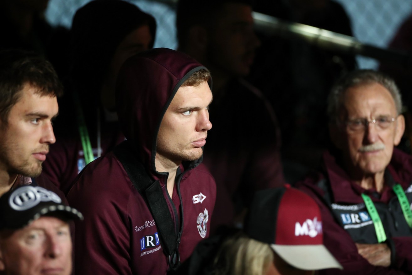 The final straw: Tom Trbojevic on the sidelines for Manly.