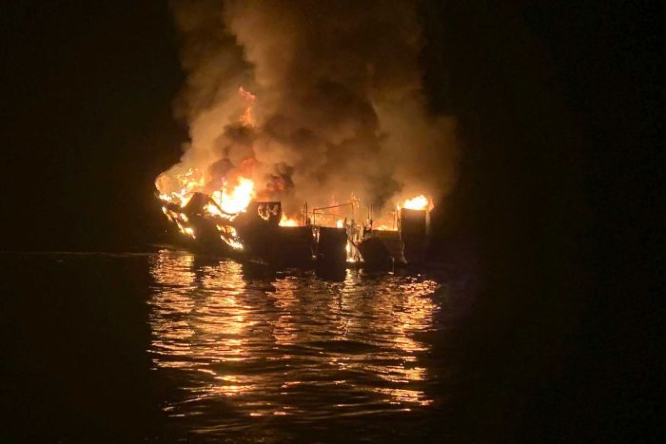 Four people are dead and more than 30 unaccounted for after fire tore through a diving boat.