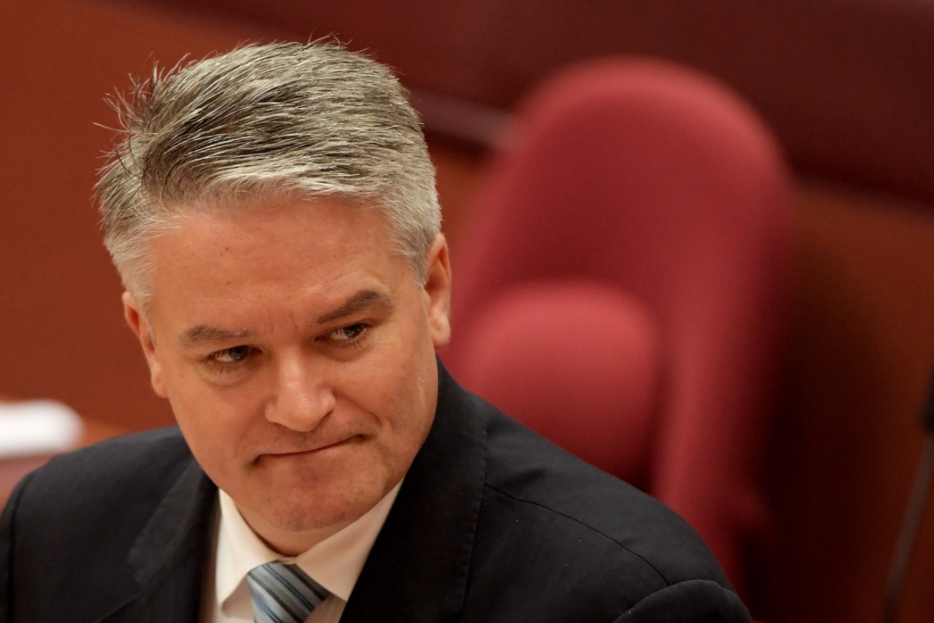 Finance Minister Matthias Cormann has described Kevin Rudd's response to the GFC as "crazy".