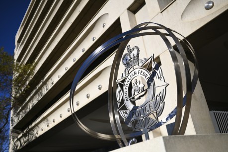 Federal police raid home of former government adviser