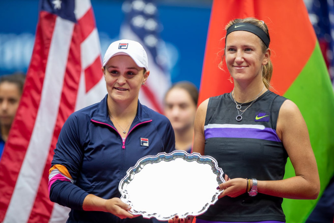 Victoria  Azarenka of Belarus and Ashleigh Barty with the runners up trophy after losing to Elise Mertens of Belgium and Aryna Sabalenka of Belarus in the Women's Doubles Final.