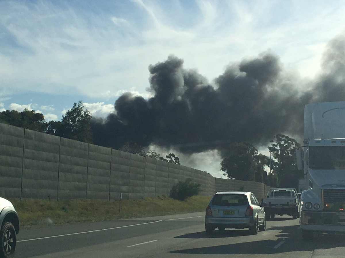 Factory Fire Covers Sydney Skyline In Thick, Black Smoke