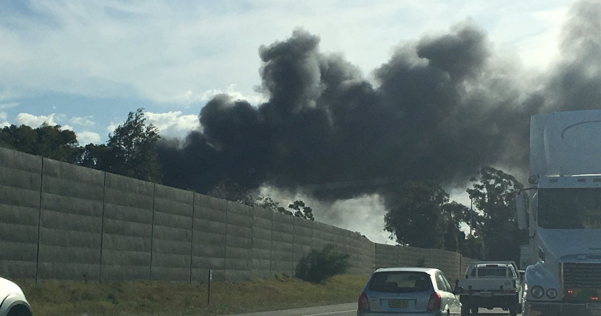 Factory fire covers Sydney skyline in thick, black smoke