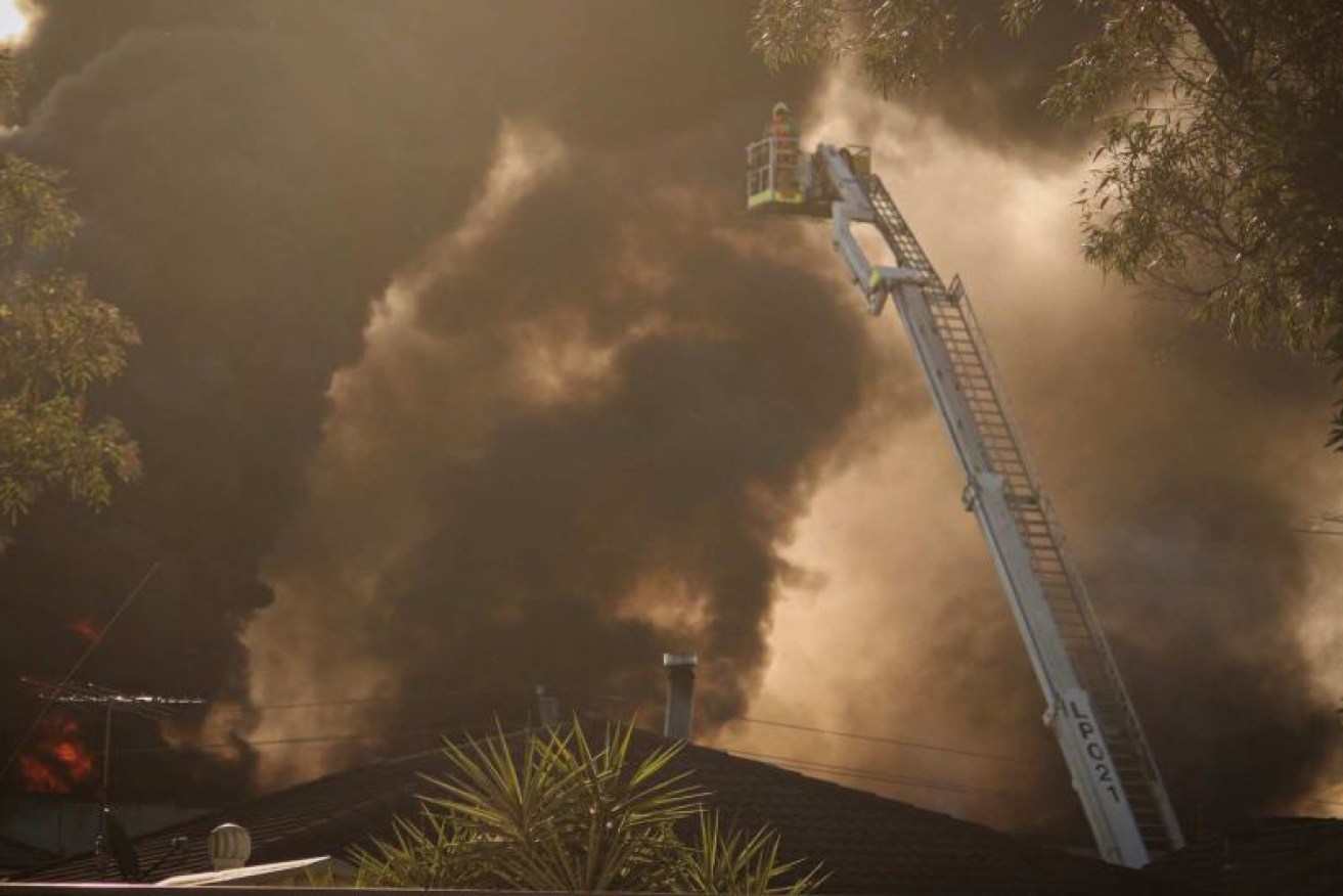Firefighters are battling a blaze at a chemical factory in Sydney's Moorebank neighbourhood.
