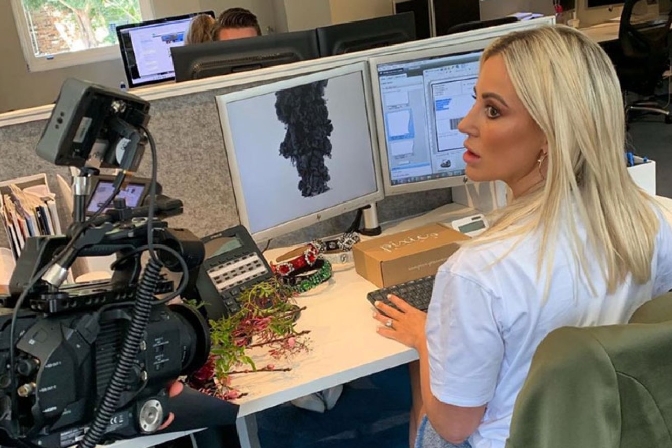 Roxy Jacenko (at work in her Sydney office on September 6) said critics of <i>I Am ... Roxy</i> can "f--k off."
