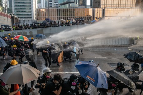 Violence as Hong Kong protesters defy police ban