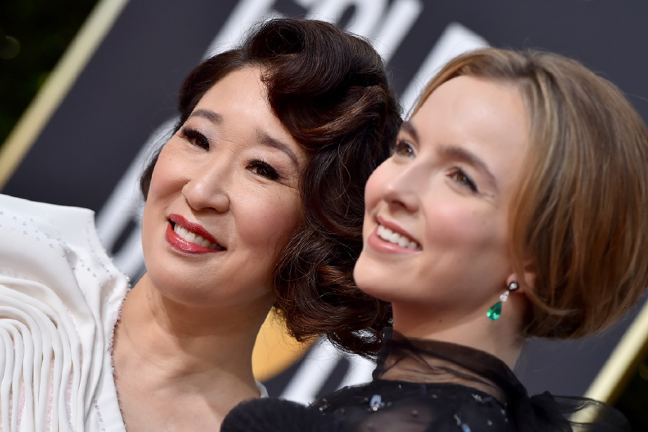 <i>Killing Eve's</i> Sandra Oh (left) and Jodie Comer at the Golden Globes in Hollywood on January 6.