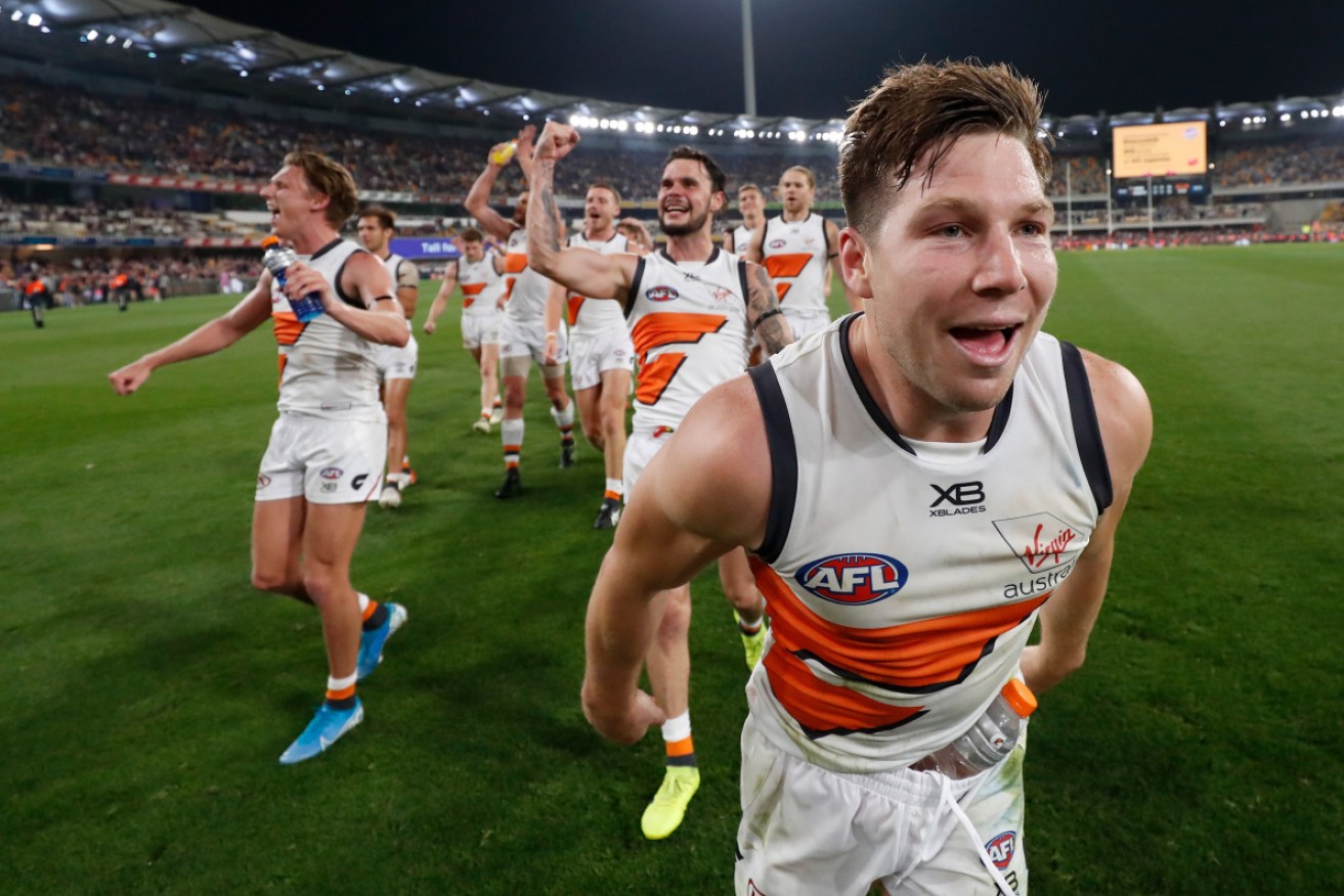 Toby Greene and his teammates after their stirring win against the Brisbane Lions. 