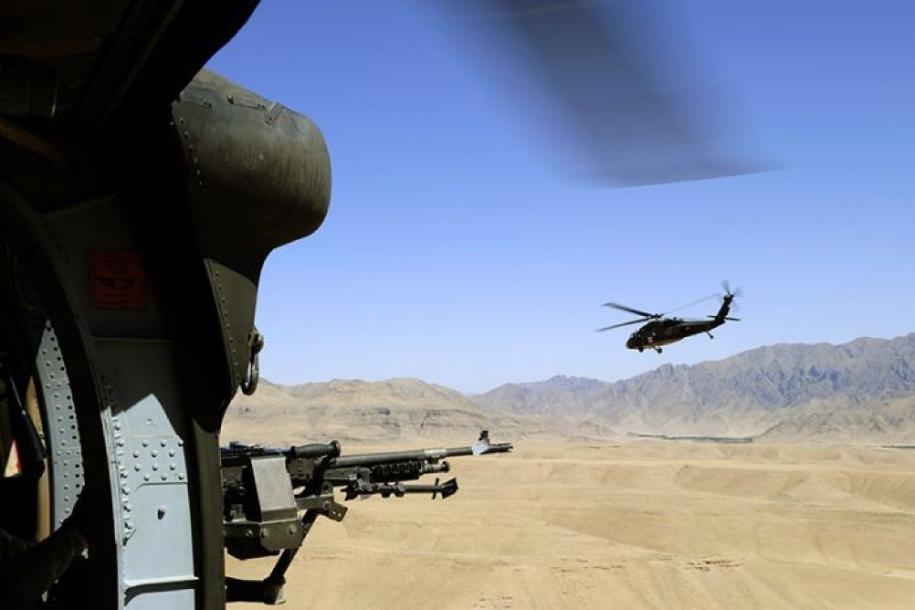 Australian soldiers flying over Uruzgan Province in Afghanistan on a mission in 2011.