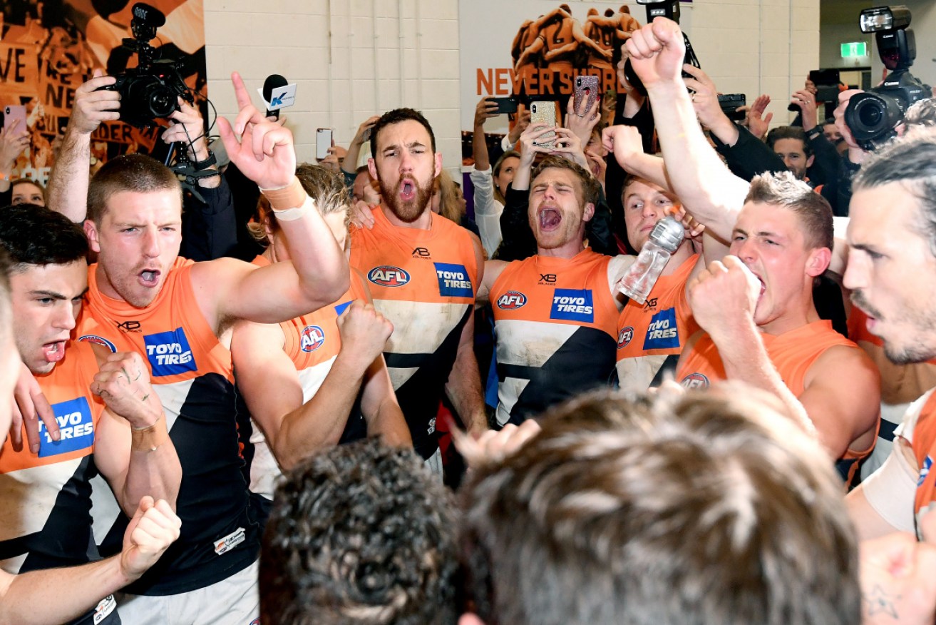 Sing it proud: The GIants are into a grand final. 
