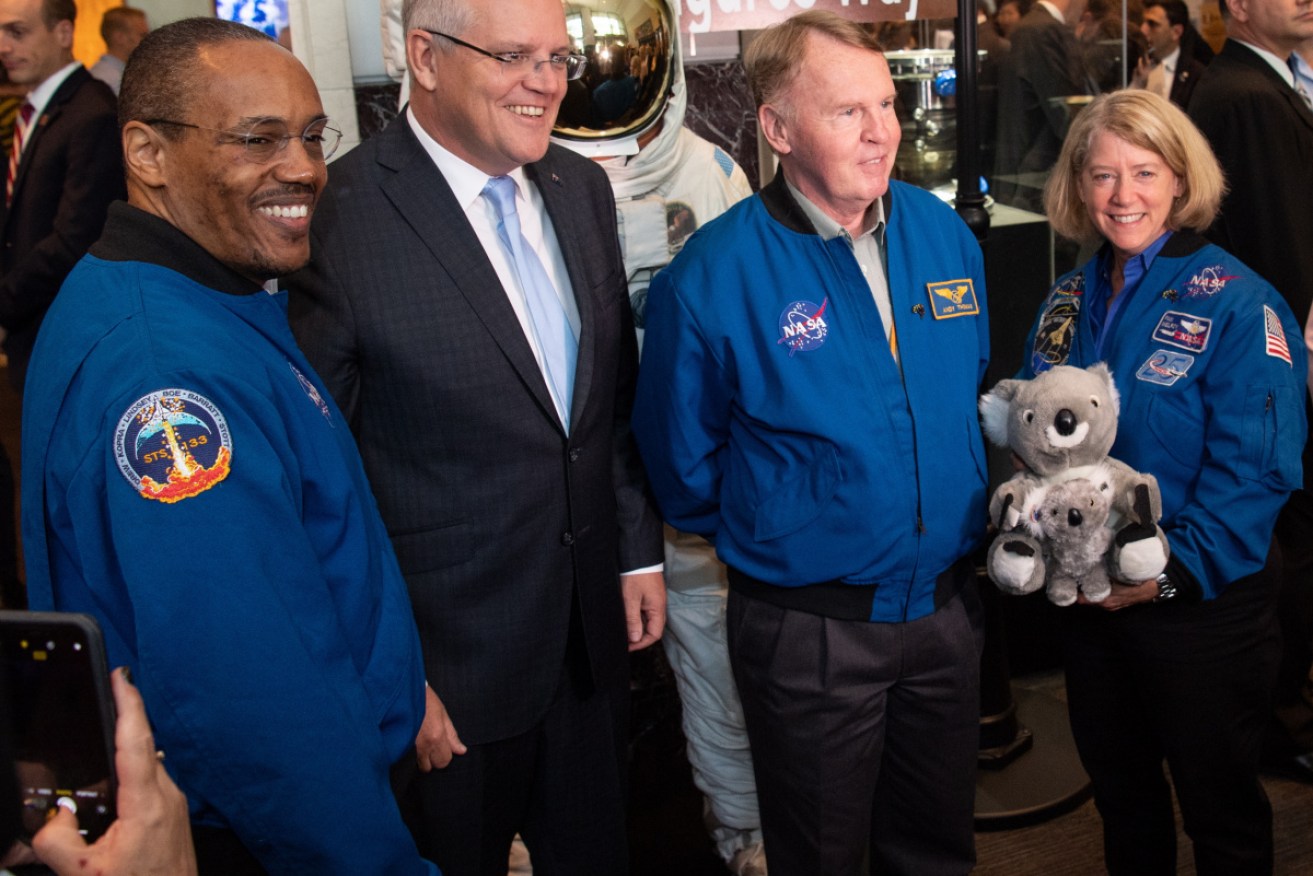 Andy Thomas (second right) with Scott Morrison at NASA headquarters in Washington.