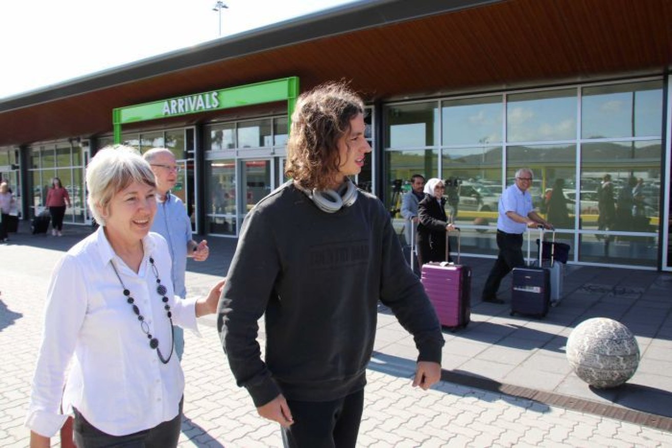 Alex Peroni at Hobart airport with his mother.  