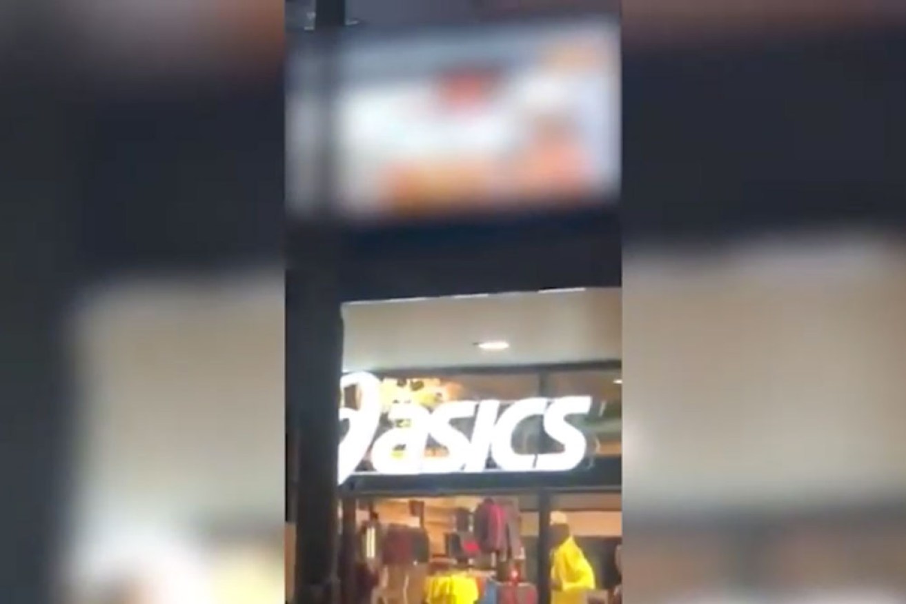 The sexually explicit content reportedly ran on the sportswear store's giant screens for nine hours before workers arrived.