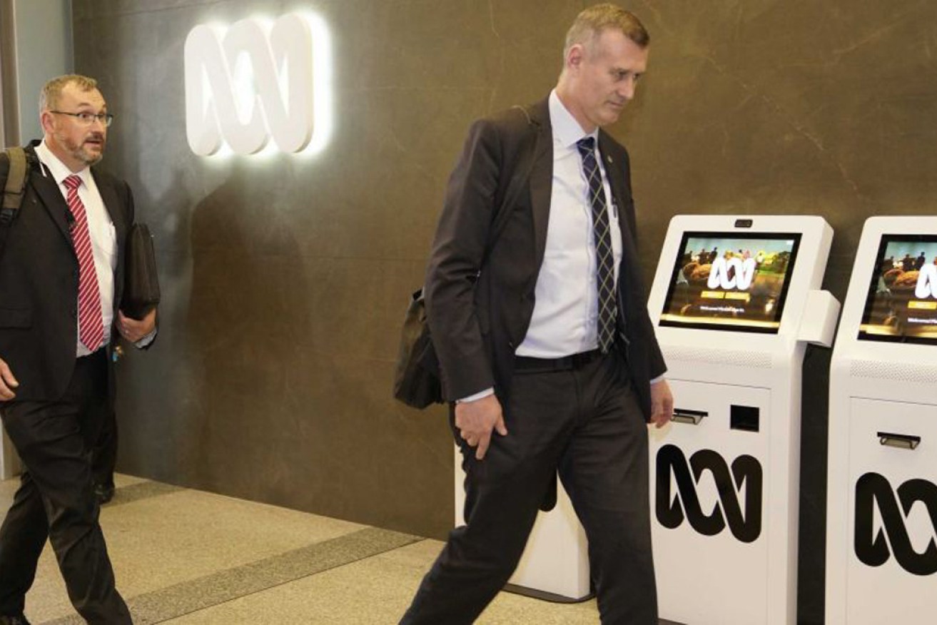 AFP officers entering the ABC headquarters in Ultimo in 2019 as part of  an investigation into leaks. 

