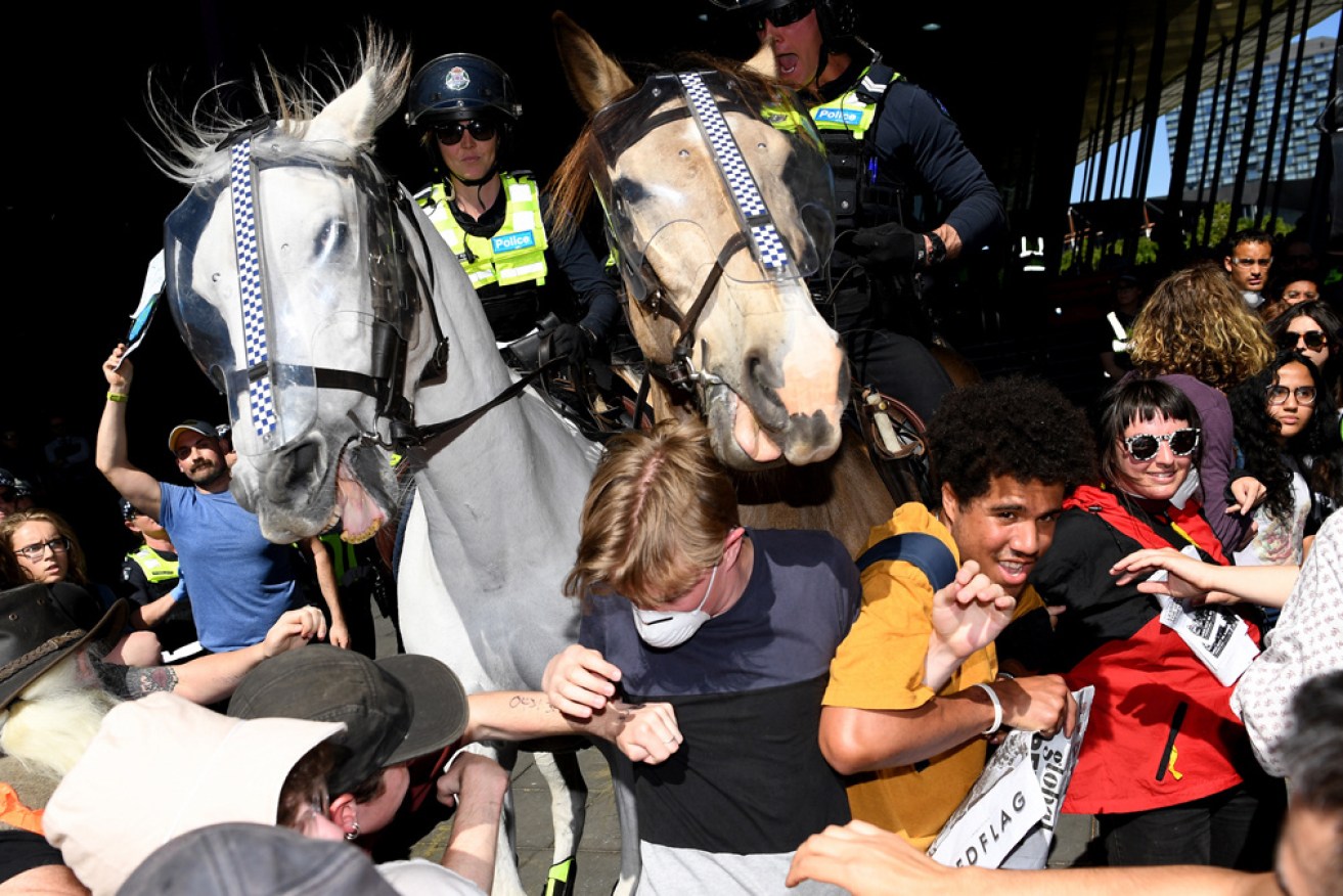 There have been violent clashes between protesters and police outside a mining conference in Melbourne this week.