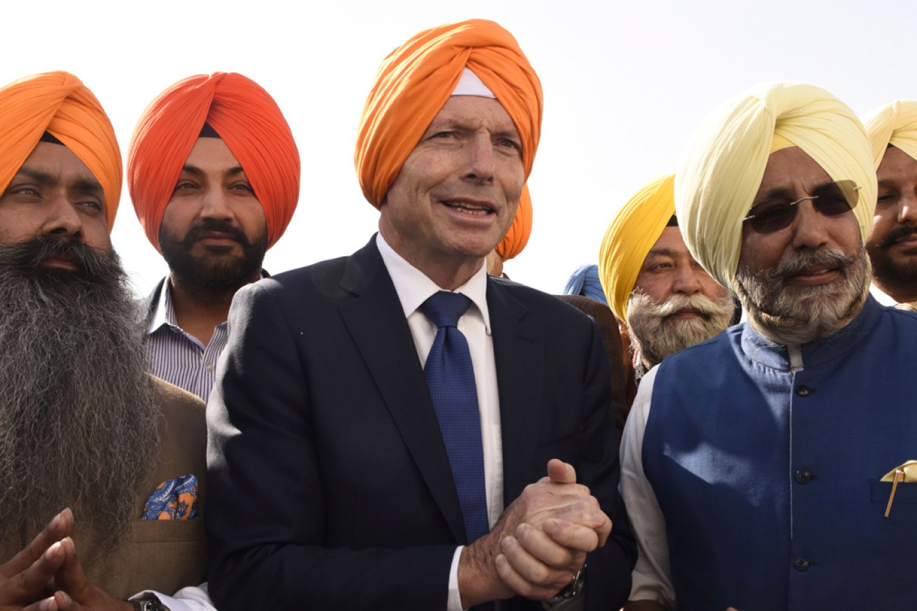 Tony Abbott visits the Golden Temple in Amristsar, India.
