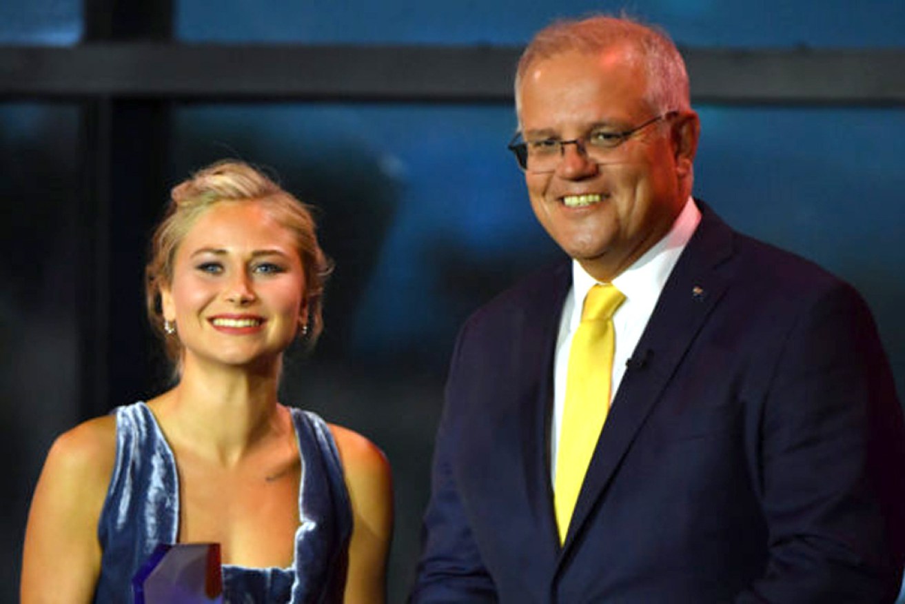 Grace Tame with Scott Morrison on the night she was named Australian of the Year.