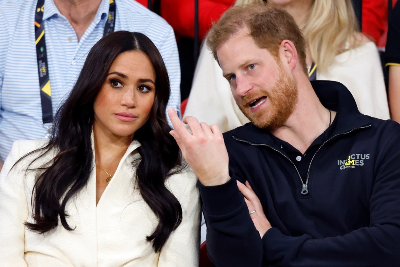 Prince Harry says he and wife Meghan Markle were "forced" to leave Britain.