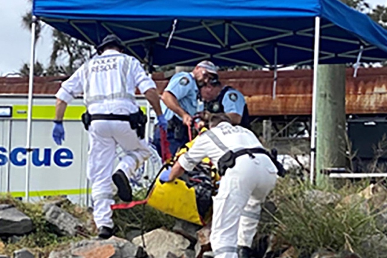 NSW Police are seeking to extradite a man over the underwater discovery of a diver's body and drugs.