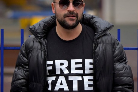 Romanian court rules to hold Tate for 30 more days