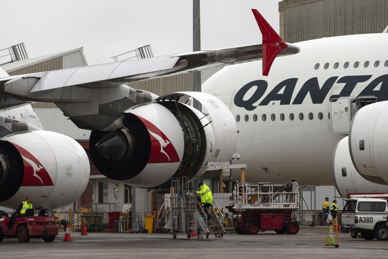 Qantas faces court action over its bid to sack more than 2000 ground staff across the country.