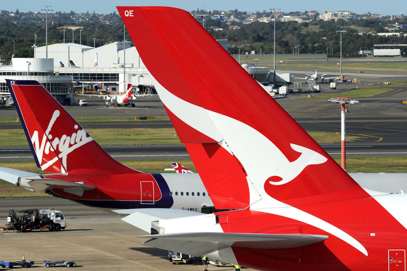 Qantas boss Alan Joyce says the airline will return to pre-pandemic domestic capacity in early 2022.