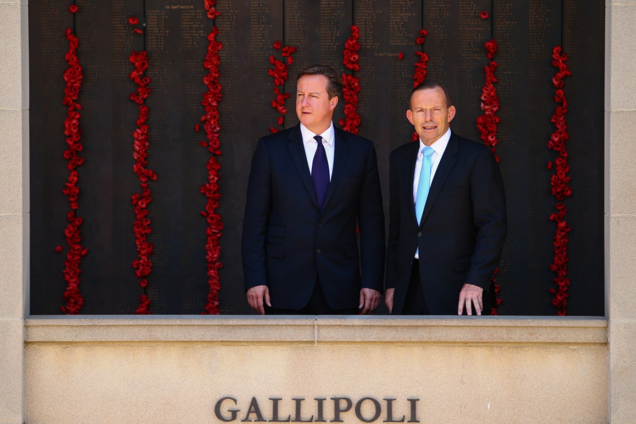 Mr Abbott at the war memorial with then British PM David Cameron in 2014.