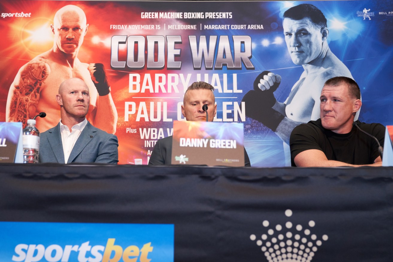 Former AFL hardman Barry Hall, right, is taking his first professional fight seriously as he prepares for the "Code War" against rugby league's Paul Gallen next month.