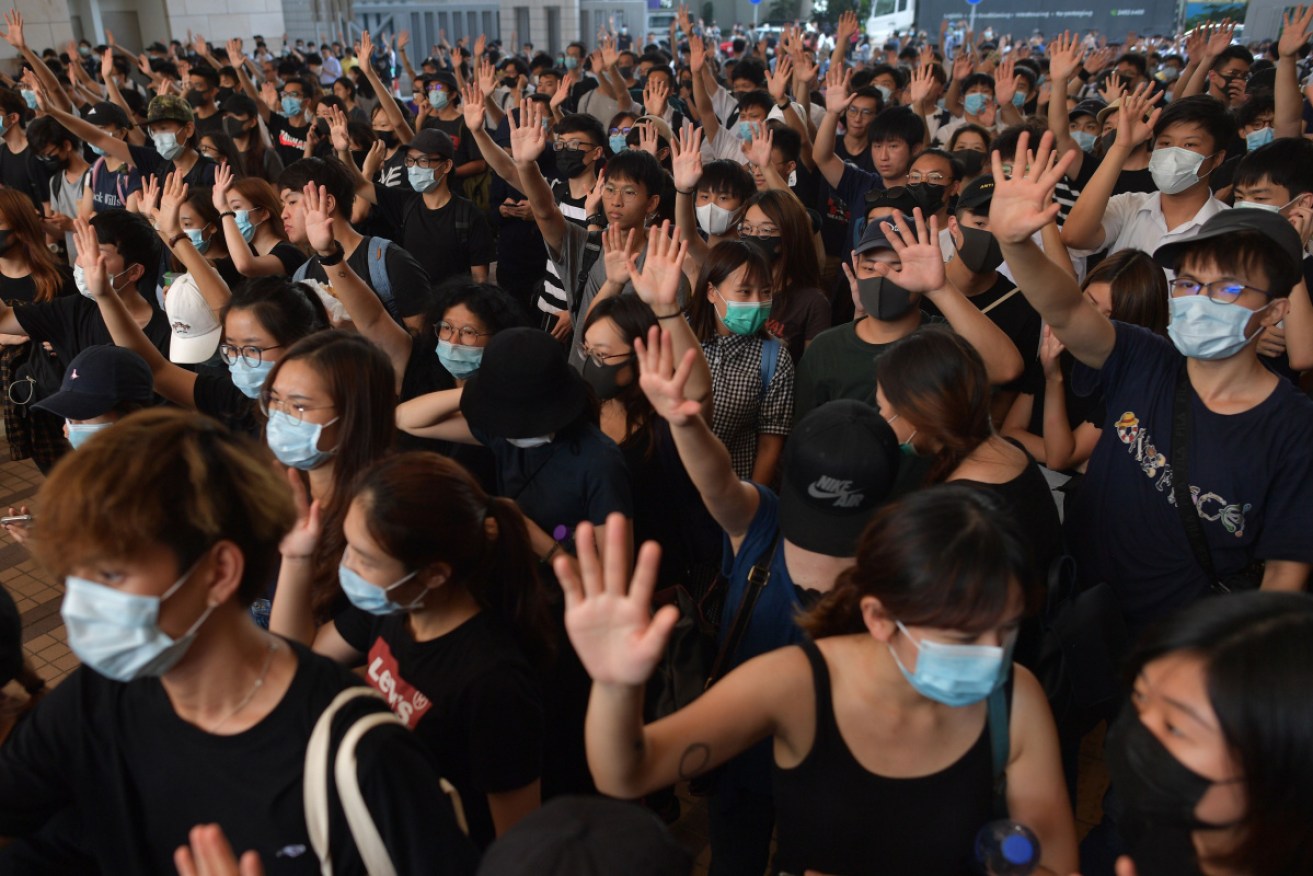 Protesters face six months in jail for donning face masks. <i>Photo: Getty</i>