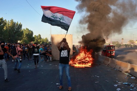 Uprising grips Iraq, 65 killed in protests