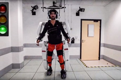 Paralysed man walks by using his mind, an AI program and robotic limbs