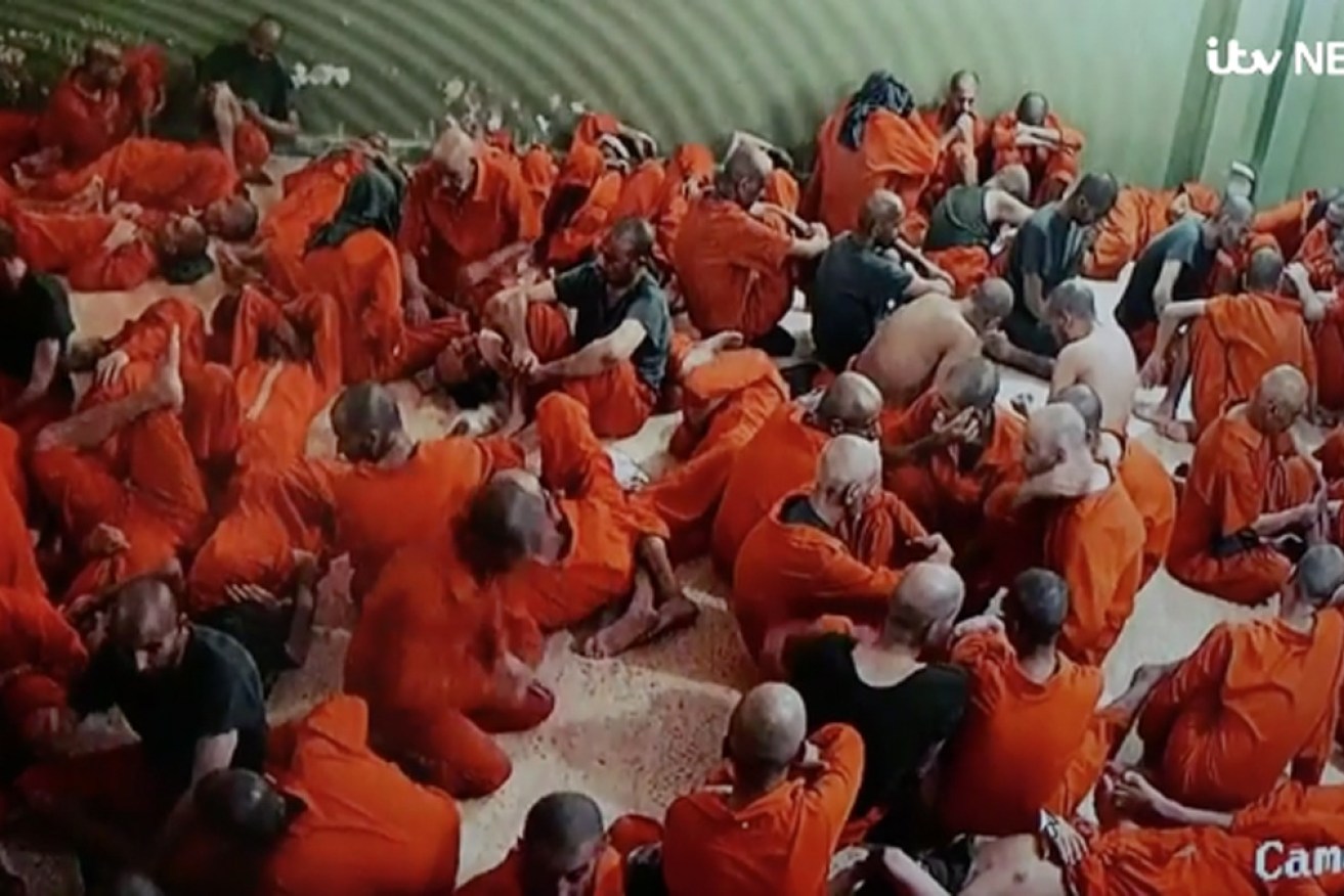 A crowded cell in the secret northern Syria jail where many ISIS fighters are being held.
