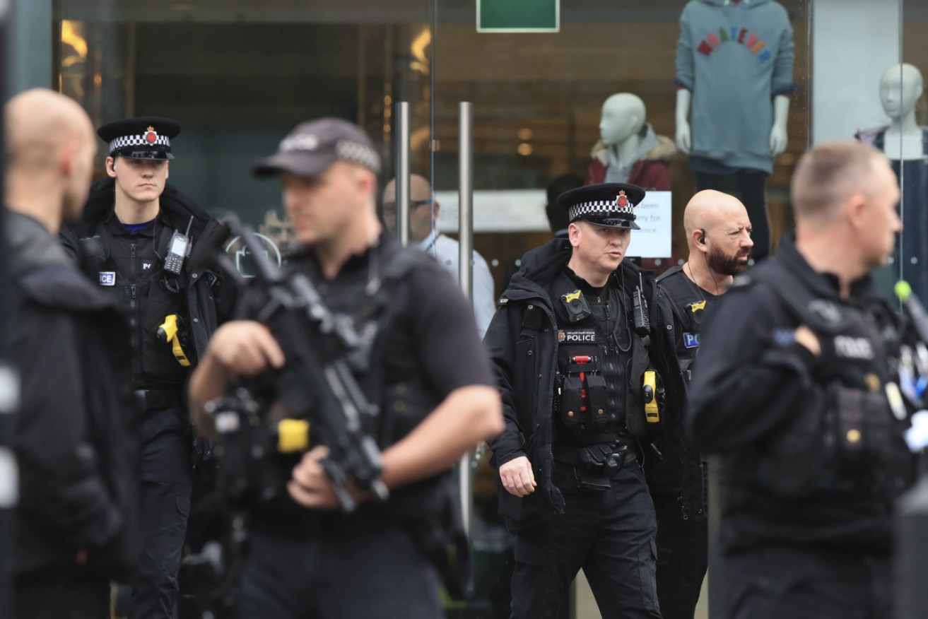 12/10/2019 12:00

Armed police officers outside the Arndale Centre in Manchester, England, Friday Oct. 11, 2019, after a stabbing incident at the shopping center that left several people injured and shoppers hidings in shops.