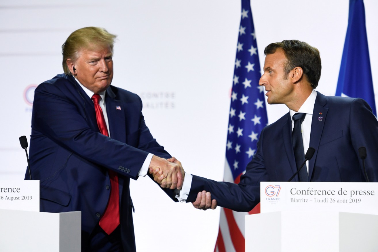 US President Trump And French President Macron have a history of trying to rip each other's arms off by way of saying "good to see you!" 