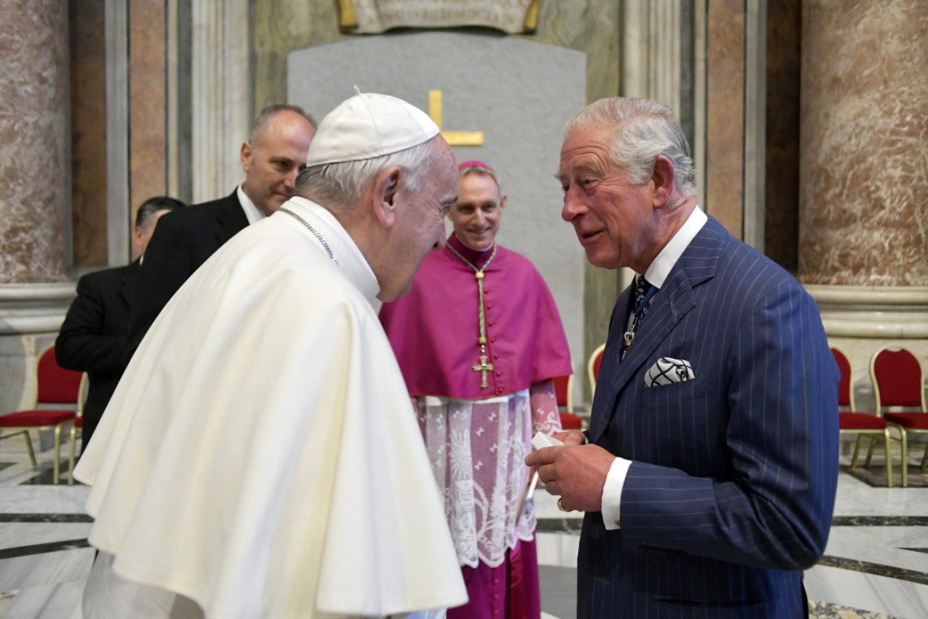 Pope Francis greets Prince Charles on a historic day at The Vatican on Sunday.